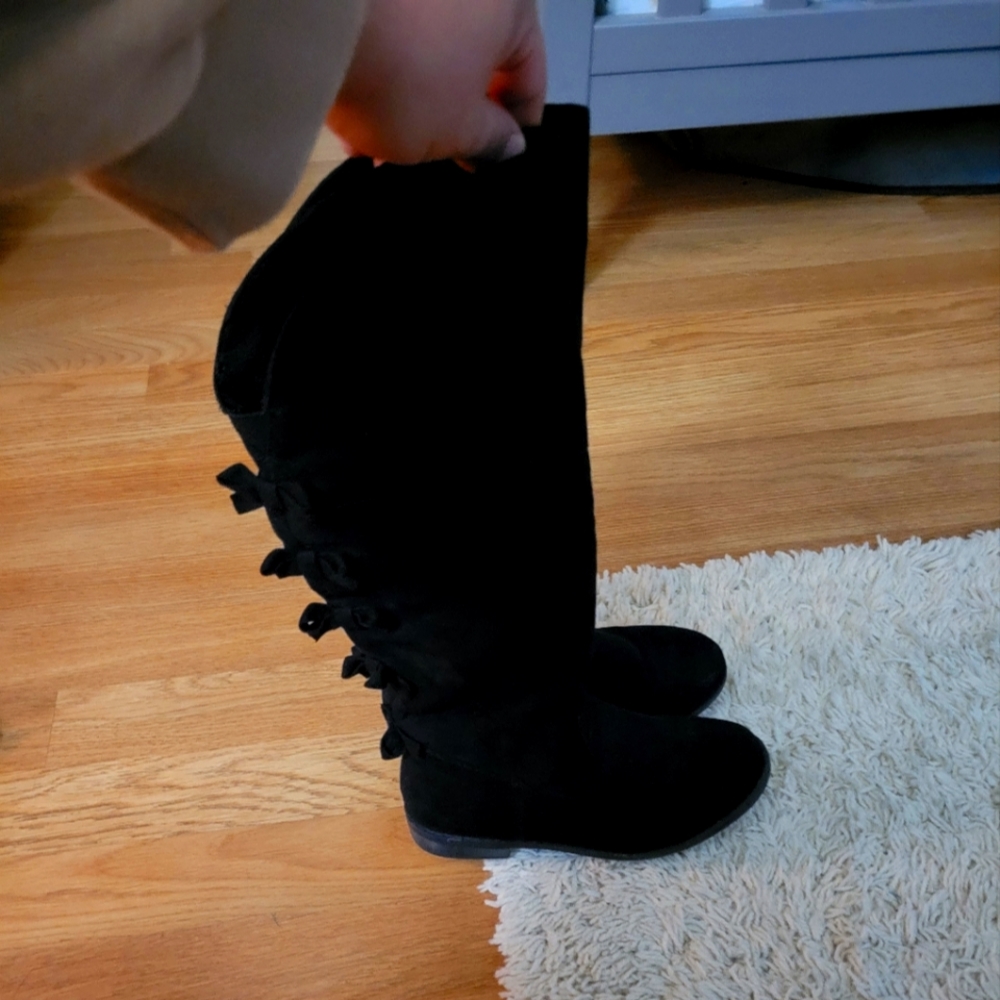 Black tall boots